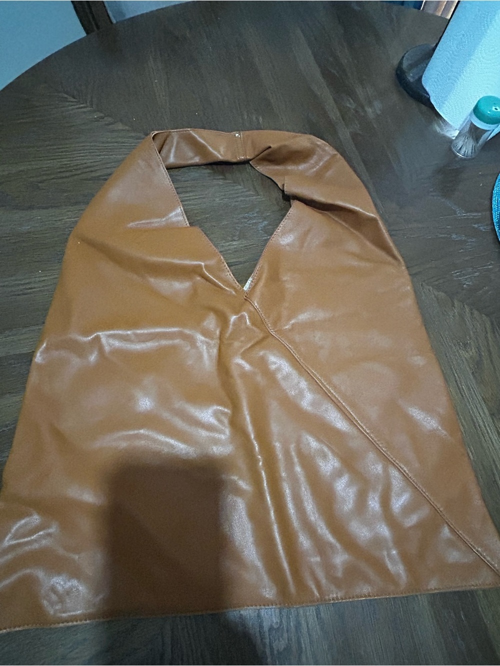 Ah-dorned reversible hobo sling purse